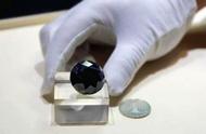 揭秘价值超2.5亿的88克拉黑钻石：神秘来源与上海之旅